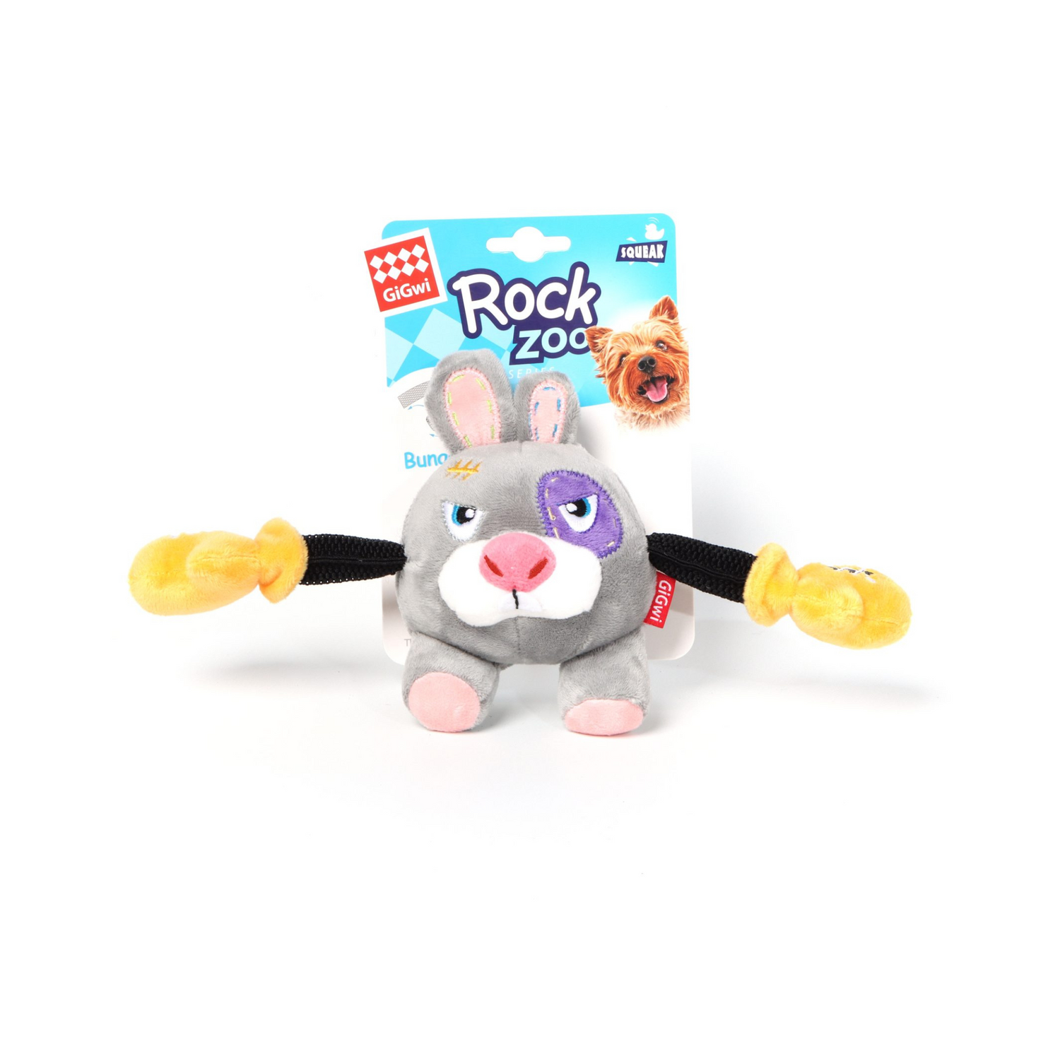 Plush dog toy with a packaging label for 'Rock Zoo' on a white background