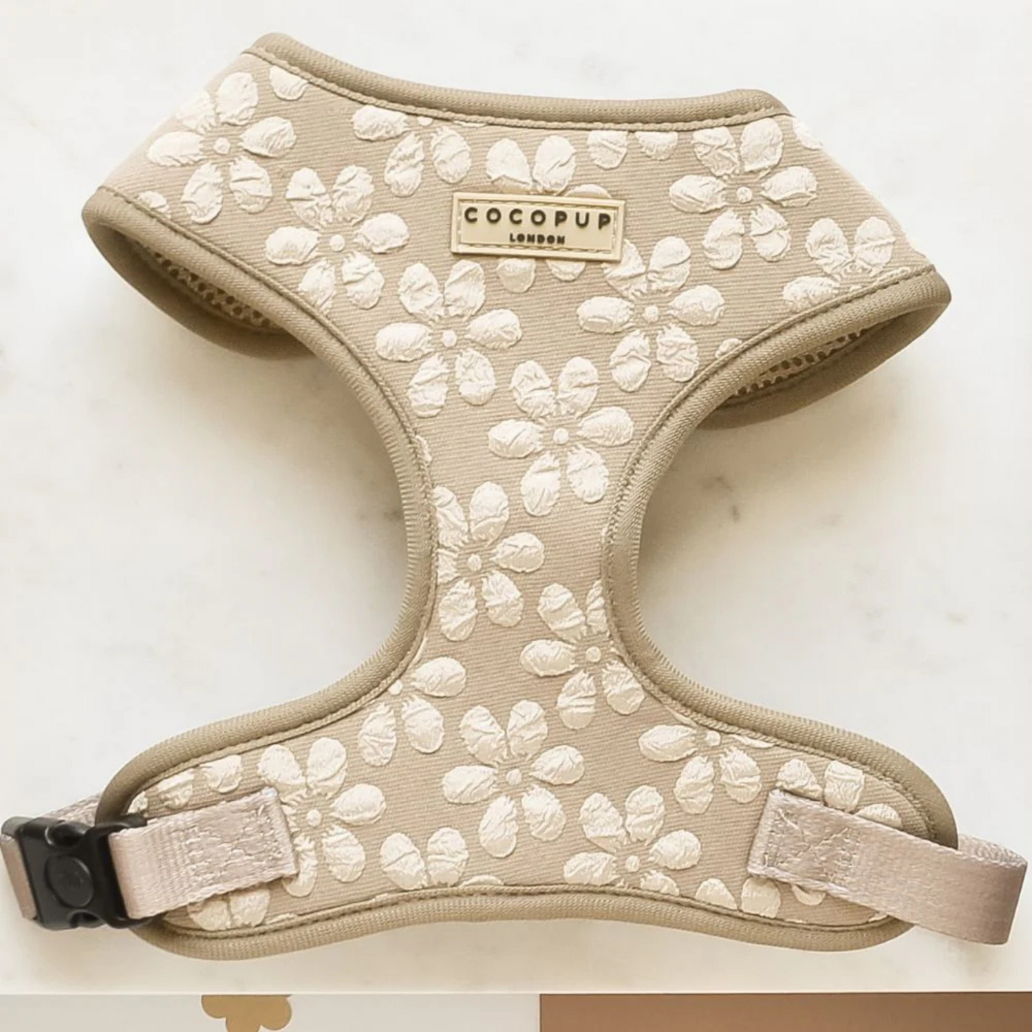 Beige floral-patterned dog harness with 'Cocopup London' branding on a white background