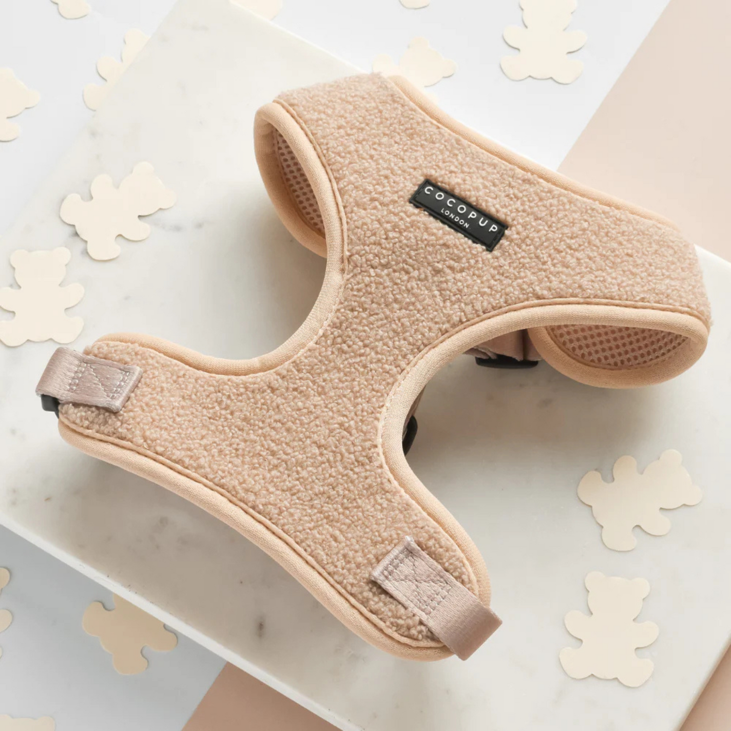 Beige pet harness with 'COCOPUP' label on a light background