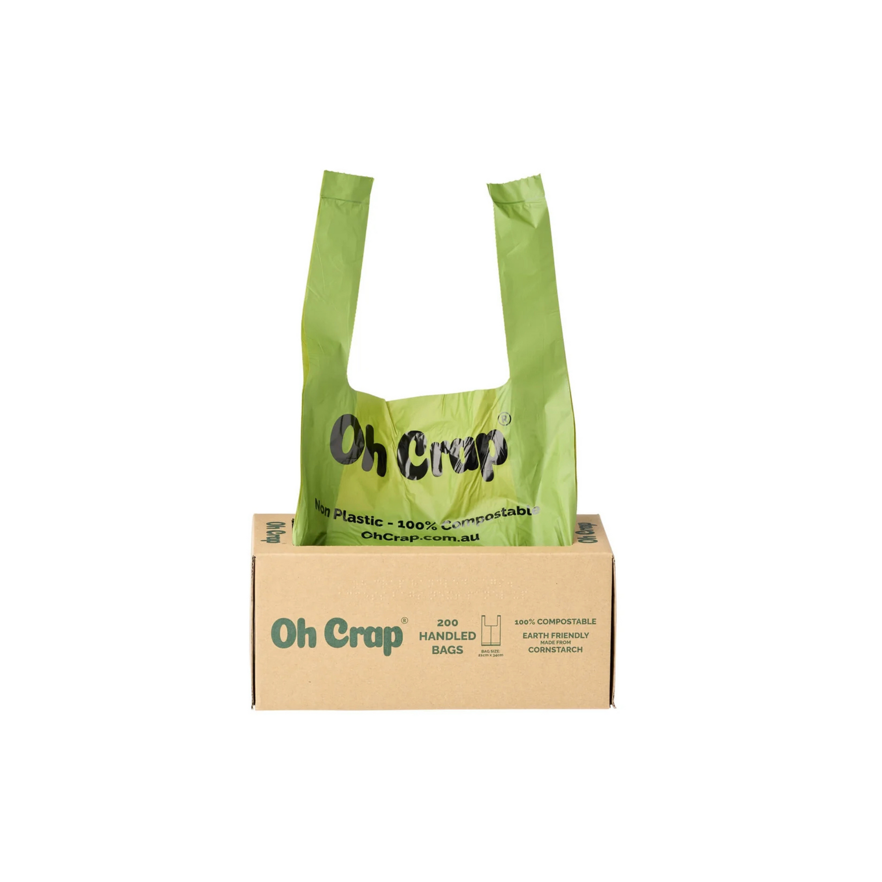 Green compostable dog waste bag with 'Oh Crap' branding on a cardboard box