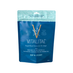 Blue package of Vitalitae superfood biscuits for dogs on a white background