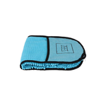 Blue microfiber towel with black border on a white background